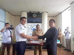 Sertijab Kepala Dinas Kominfo dari Hengkie Yusenimus Supit SIP kepada Jusak TS Pandeirot SPd MM