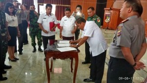 penandatanganan kesepakatan bersama antara Pemerintah, TNI dan Polri
